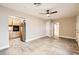 Open-concept living area featuring tile floors and access to the kitchen and bedrooms at 701 W Cambridge Ave, Phoenix, AZ 85007