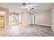 Spacious main bedroom with tile flooring, closet, ceiling fan, and ample natural light at 701 W Cambridge Ave, Phoenix, AZ 85007