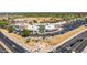 Aerial view showcasing a shopping center with convenient parking and prominent businesses at 7027 N Scottsdale Rd # 225, Paradise Valley, AZ 85253