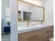 Double vanity bathroom with modern light fixtures and gold accents at 7027 N Scottsdale Rd # 225, Paradise Valley, AZ 85253