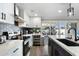 Modern kitchen with stainless steel appliances and view of backyard at 7837 N 13Th St, Phoenix, AZ 85020