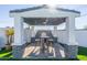 Relaxing pergola with outdoor seating and built-in grill at 7837 N 13Th St, Phoenix, AZ 85020