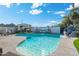 Inviting kidney shaped pool with a waterfall feature at 7837 N 13Th St, Phoenix, AZ 85020