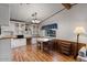 Casual dining area with wood floors and built-in hutch at 8103 E Southern Ave # 39, Mesa, AZ 85209