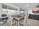 Bright dining area with table and chairs, near living room at 8513 N 172Nd Ln, Waddell, AZ 85355