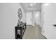 Entryway with console table and flooring at 8513 N 172Nd Ln, Waddell, AZ 85355