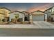 House exterior view with landscaping and two-car garage at 8513 N 172Nd Ln, Waddell, AZ 85355