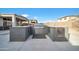 Outdoor kitchen with built-in grill and ample counter space at 8513 N 172Nd Ln, Waddell, AZ 85355