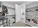 Spacious walk-in closet with built-in shelving and rods at 8513 N 172Nd Ln, Waddell, AZ 85355