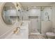 Elegant bathroom with double sinks, frameless shower, and gold accents at 8614 E Appaloosa Trl, Scottsdale, AZ 85258