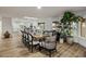 Bright dining room featuring a large wooden table and stylish chairs at 8614 E Appaloosa Trl, Scottsdale, AZ 85258