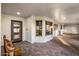 Inviting entryway with a wooden bench and a view into the house at 8614 E Appaloosa Trl, Scottsdale, AZ 85258