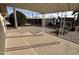 Brick patio under covered structure; view of neighboring homes at 9302 E Broadway Rd # 24, Mesa, AZ 85208