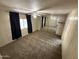 Carpeted bedroom with mirrored closet doors and ceiling fan at 9302 E Broadway Rd # 24, Mesa, AZ 85208