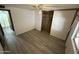 Bedroom with wood-look floors and a closet at 9302 E Broadway Rd # 24, Mesa, AZ 85208