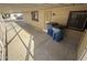 Covered patio area with trash cans and side yard access at 9302 E Broadway Rd # 24, Mesa, AZ 85208