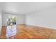 Bright living room with terracotta tile floors and access to a balcony at 1006 E Osborn Rd # C, Phoenix, AZ 85014