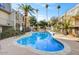 Relaxing kidney-shaped swimming pool in a sunny courtyard setting at 1006 E Osborn Rd # C, Phoenix, AZ 85014