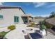 Outdoor patio with fire pit, seating area, and desert landscaping at 10359 E Morning Star Dr, Scottsdale, AZ 85255