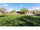 Community center with grassy area and desert landscaping at 10359 E Morning Star Dr, Scottsdale, AZ 85255