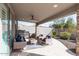 Covered patio with seating area and built-in grill at 10359 E Morning Star Dr, Scottsdale, AZ 85255