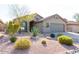 Single-story home with attractive landscaping and a two-car garage at 10359 E Morning Star Dr, Scottsdale, AZ 85255