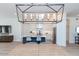 Modern kitchen with white cabinets, a large island, and pendant lighting at 10359 E Morning Star Dr, Scottsdale, AZ 85255