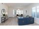 Living room with hardwood floors, built-in shelving and large windows at 10359 E Morning Star Dr, Scottsdale, AZ 85255