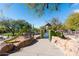 Community playground with climbing structures and slides at 10359 E Morning Star Dr, Scottsdale, AZ 85255