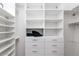 Bright, spacious walk-in closet with ample shelving and drawers at 10359 E Morning Star Dr, Scottsdale, AZ 85255