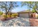 One-story home with a garage and well-maintained landscaping at 10387 W Runion Dr, Peoria, AZ 85382