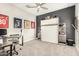 Bedroom with built-in murphy bed and workspace at 10712 E Trillium Ave, Mesa, AZ 85212