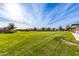 Expansive green lawn perfect for outdoor recreation and relaxation at 10712 E Trillium Ave, Mesa, AZ 85212