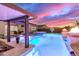 Luxury pool with spa and fire features; perfect for entertaining at 10712 E Trillium Ave, Mesa, AZ 85212