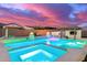 Resort-style pool with spa and fire pits at 10712 E Trillium Ave, Mesa, AZ 85212