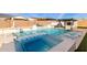 Resort-style pool with spa and relaxing lounge areas at 10712 E Trillium Ave, Mesa, AZ 85212