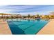 Community pool with shade structures and lap lanes at 10712 E Trillium Ave, Mesa, AZ 85212