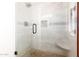 Updated bathroom with walk-in shower and glass enclosure at 10714 W Saratoga Cir, Sun City, AZ 85351