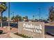 Palmbrook Country Club sign in parking lot at 10714 W Saratoga Cir, Sun City, AZ 85351