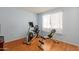 Bright room with exercise equipment, including stationary bike at 10714 W Saratoga Cir, Sun City, AZ 85351