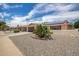 House exterior showcasing street view and solar panels at 10714 W Saratoga Cir, Sun City, AZ 85351