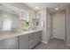 Elegant bathroom with double vanity and gray cabinets at 1080 S 151St Ln, Goodyear, AZ 85338