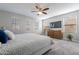 Bright bedroom featuring large windows and a modern dresser at 1080 S 151St Ln, Goodyear, AZ 85338