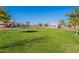 Expansive green lawn in a Gathering-friendly community at 1080 S 151St Ln, Goodyear, AZ 85338