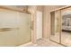 Bathroom with shower and mirrored closet doors at 10949 W Sierra Pinta Dr, Peoria, AZ 85373