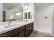 Bathroom boasts double vanity and a large walk-in shower at 11005 E Texas Ave, Mesa, AZ 85212