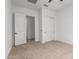 Spacious bedroom with double door closet and access to hallway at 11005 E Texas Ave, Mesa, AZ 85212