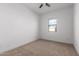 Bedroom with window, ceiling fan, and closet at 11005 E Texas Ave, Mesa, AZ 85212