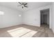 Well lit bedroom with ceiling fan and carpet flooring at 11005 E Texas Ave, Mesa, AZ 85212