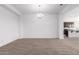 Dining area with chandelier and view to the kitchen at 11005 E Texas Ave, Mesa, AZ 85212